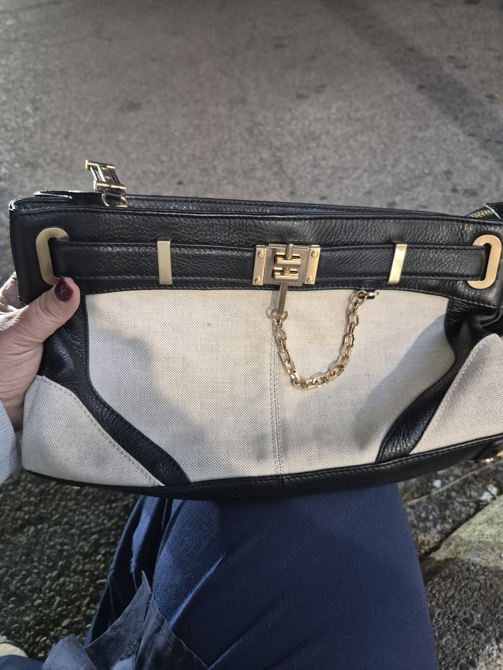 RACHEL Rachel Roy Black and Cream Canvas Clutch with Gold Chain Accent